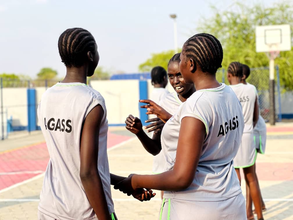 Netball team discussing tactics
